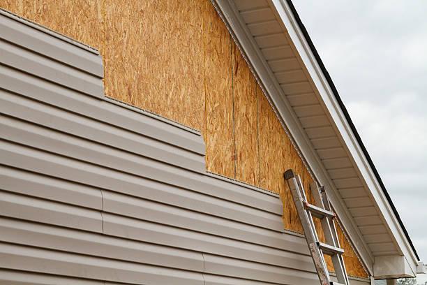 Professional Vinyl Siding technician working in Guys Mills, PA